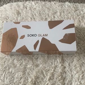 A  SOKO Glam facial treatment product still in box